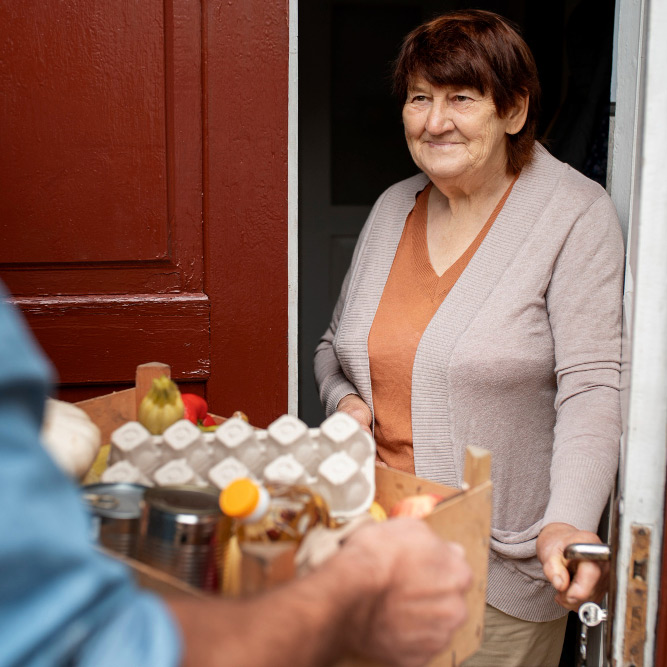 person-helping-their-elder-neighbour